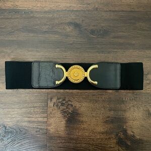 motion east black and gold stretchy belt